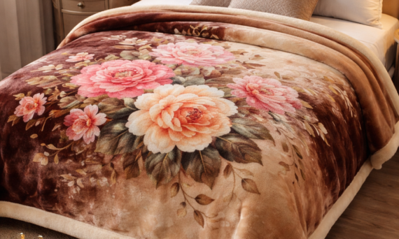 Soft floral mink blanket on elegant bed with warm interior lighting